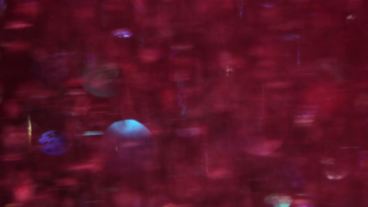 Abstract Blurry Red Background with Sparkling Bokeh Lights