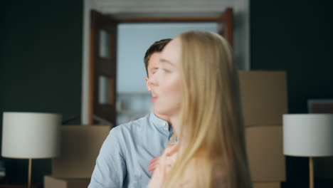 Angry-girlfriend-squabbling-boyfriend-at-home-close-up.-Couple-confrontation.