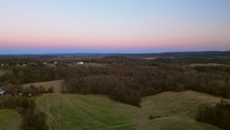 Countryside-aerial-drone-view-of-rolling-hills