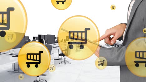 Animation-of-flying-shopping-trolley-icons-over-office