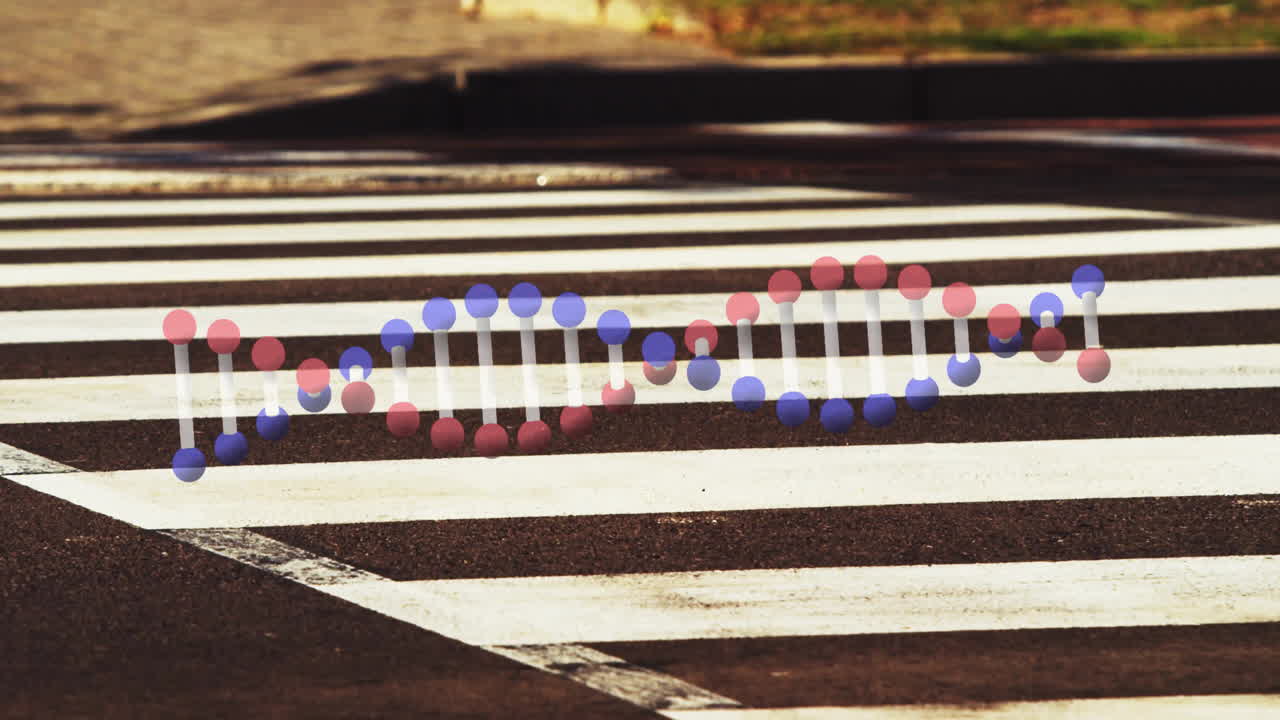 Animating DNA strand over pedestrian crossing at night in urban setting