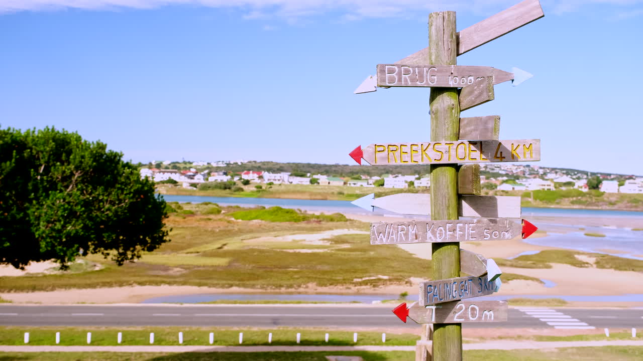 South African Coastal Signpost Guiding Tourists to Various Locations