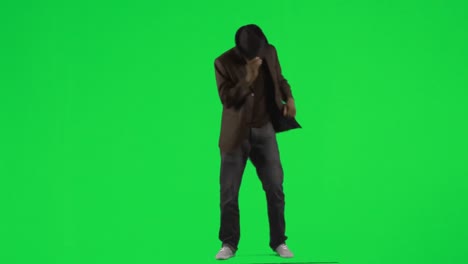 ethnic young man dancing with a hat and a jacket footage