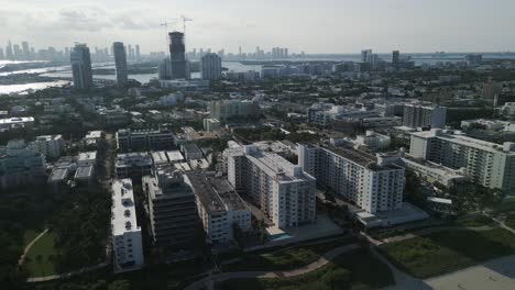 aerial skyline of miami south beach during sunny day drone footage
