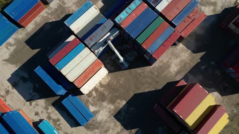 Aerial-view-of-shipping-containers,-semi-trucks-cargo-distribution-of-containers