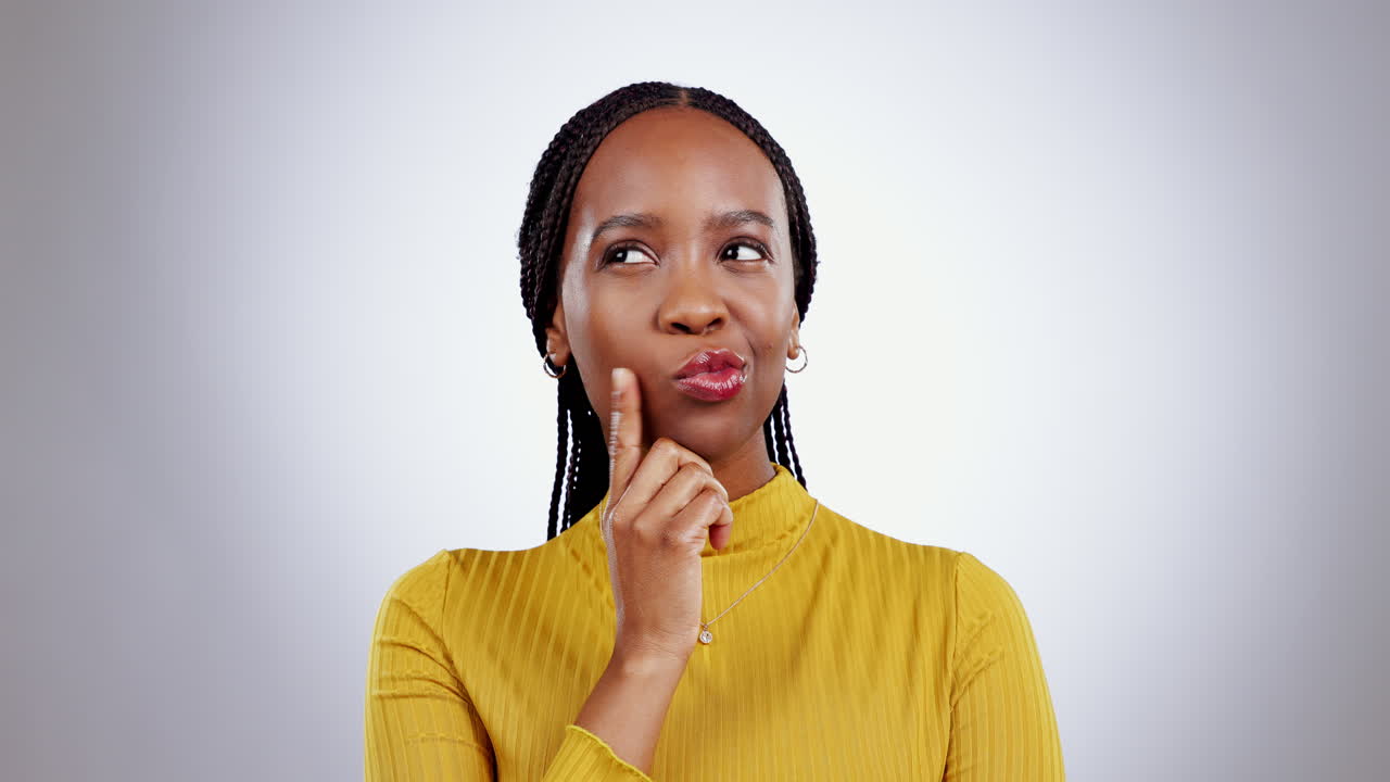 Happy woman, thinking and ideas in studio
