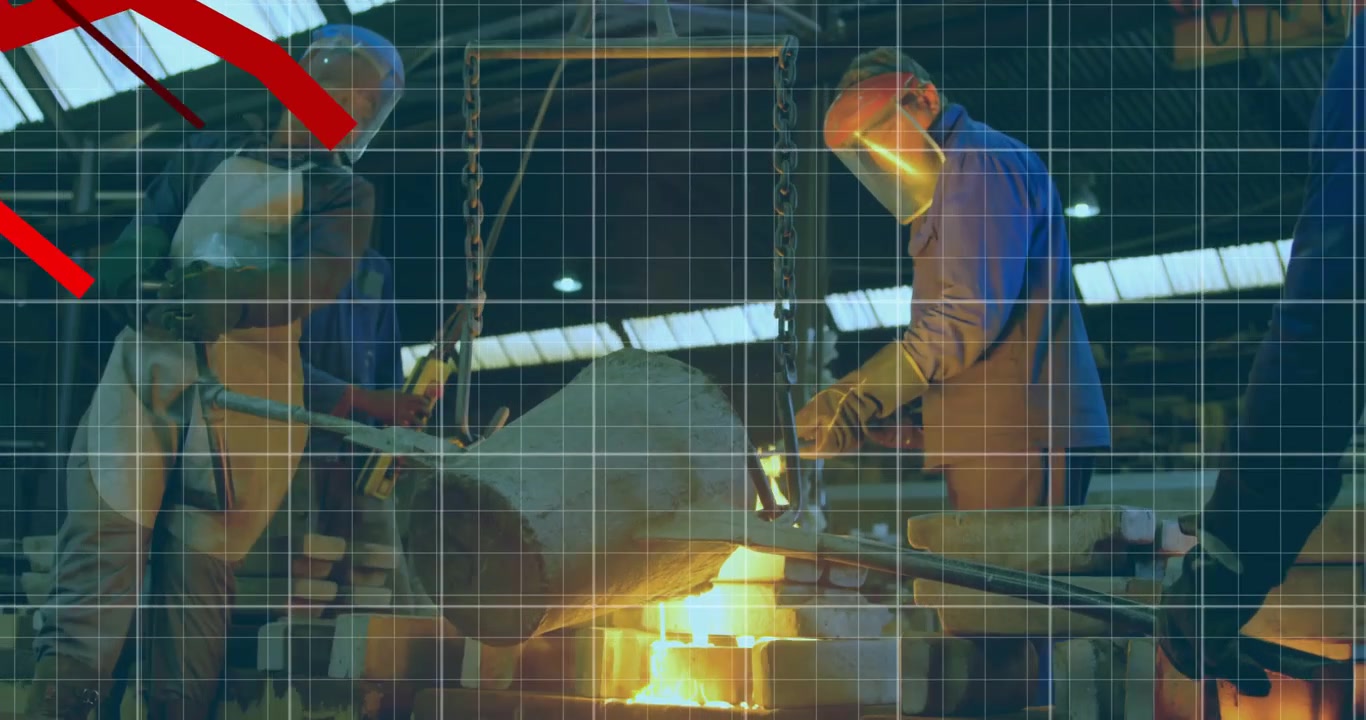 Two metalworkers lowering crucible and pouring molten metal into mold in foundry