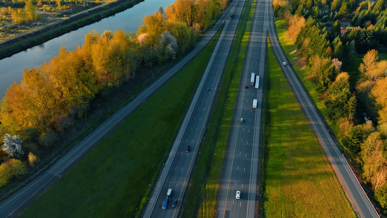 Highways in the picturesque rural countryside. Top view of the river near the village with cottage houses. Top view.