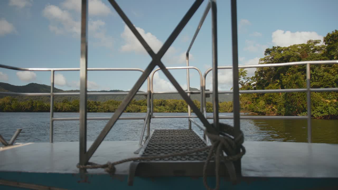 Scenic River View from the Front of a Boat