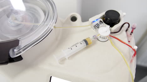 machine separating plasma from blood. close up. modern equipment preparing prp concentrate.