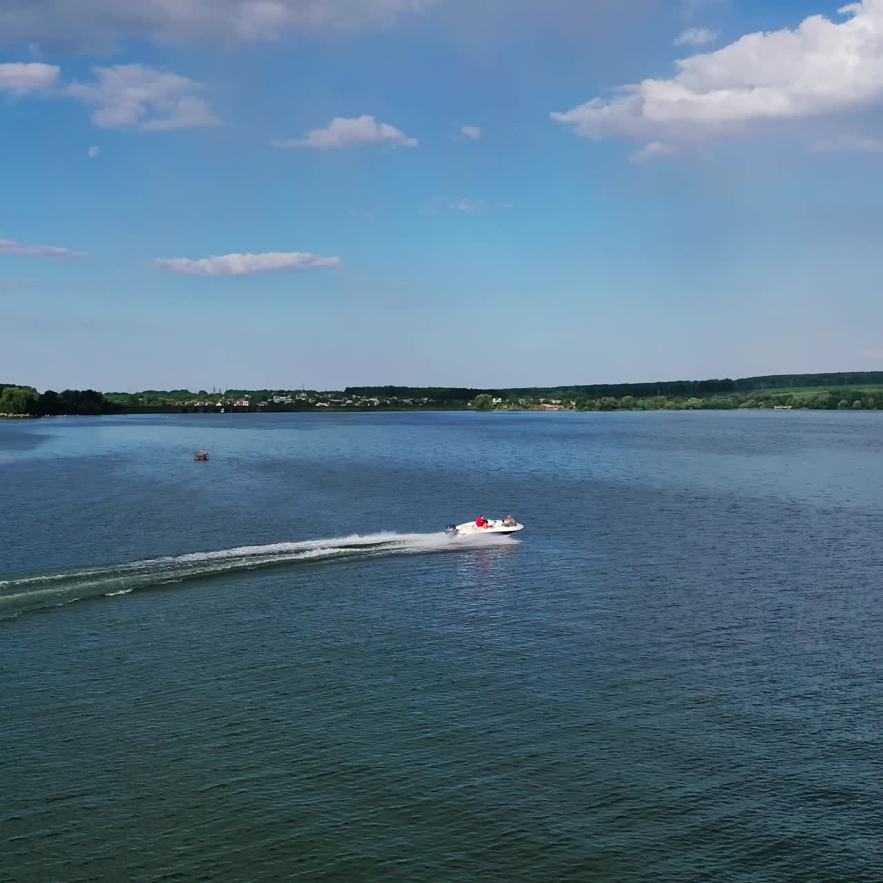 Motor boat going fast on water