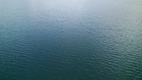 drone backward of the walensee lake near weesen, switzerland