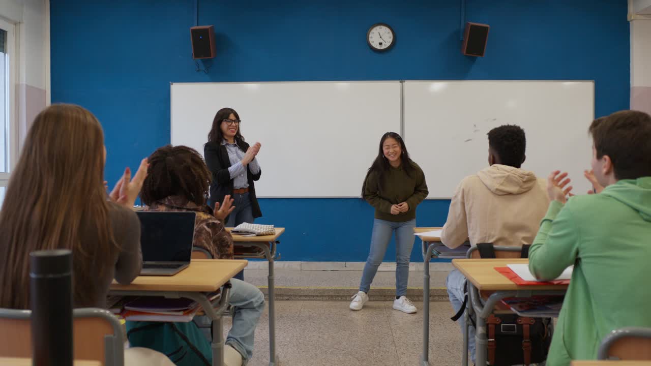 Students giving a presentation in class
