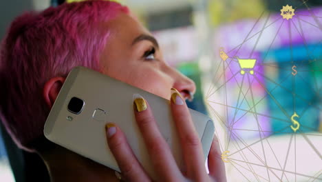 animación de iconos conectados globo sobre mujer biracial hablando en teléfono celular mientras está sentada en el coche