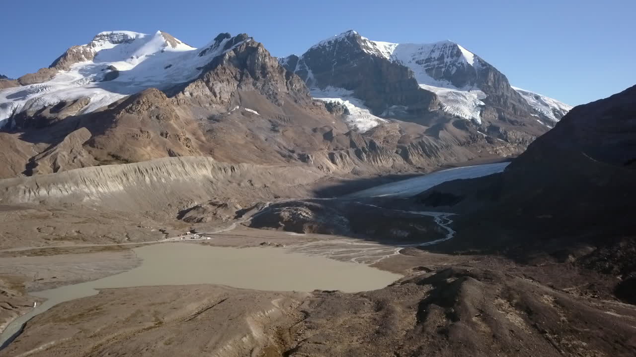 Aerial View of Majestic Glacier and Mountain Range