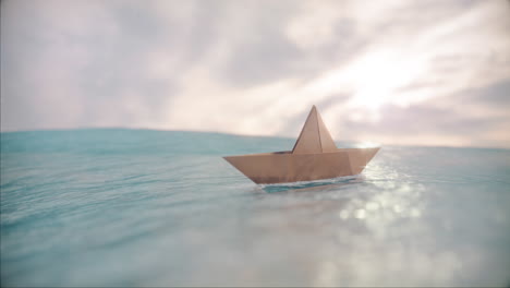 a paper boat wobbling in the ocean