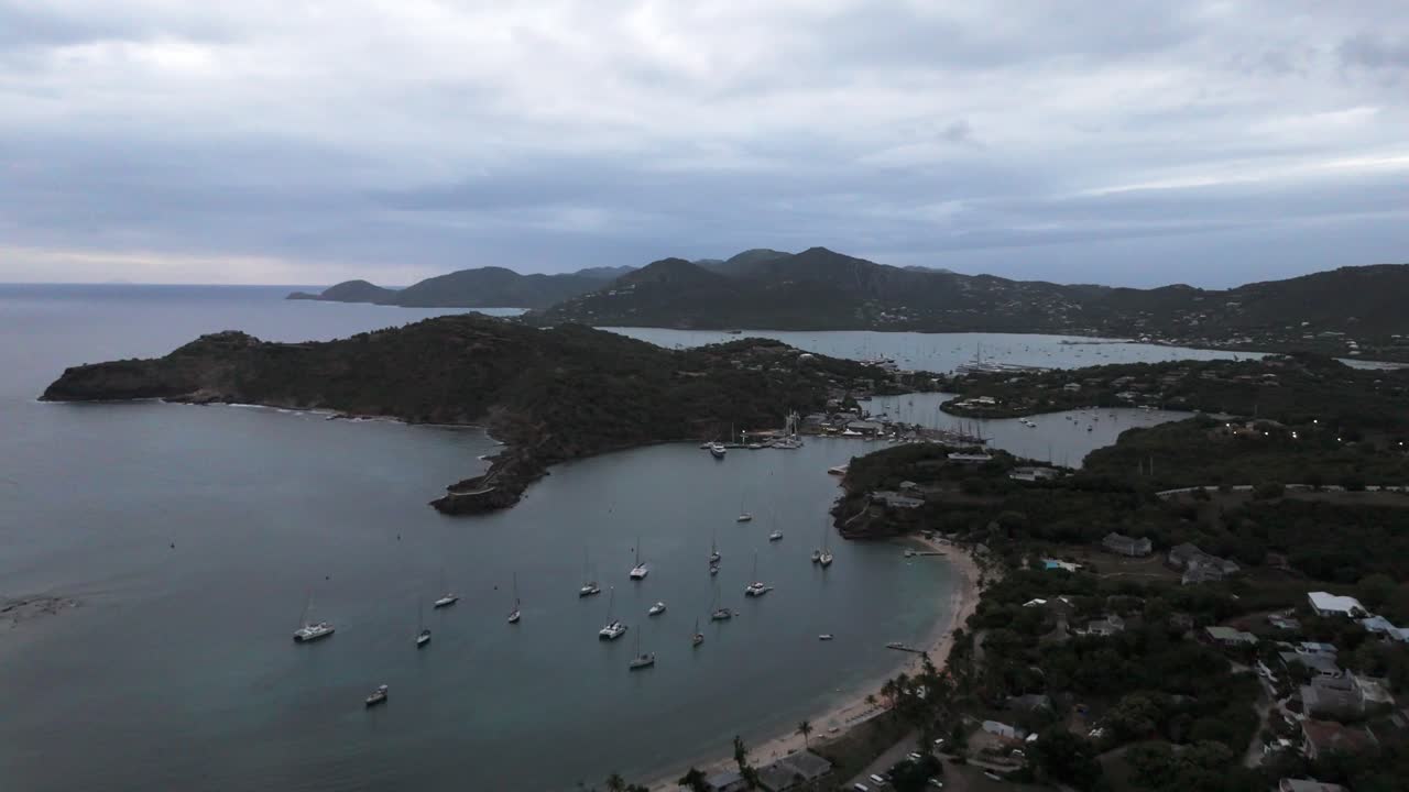 Shirley Heights Lookout Overlooking Sailboats At Freeman's Bay At Sunset In English Harbour, Antigua And Barbuda. Aerial Shot