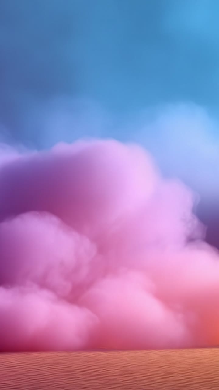 Uno straordinario spettacolo visivo di nuvole di fumo colorate che si fondono perfettamente in un cielo blu vibrante sopra morbide dune di sabbia ondulate, creando un paesaggio astratto.