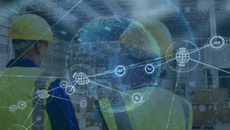 animation of globe with network of connections with icons over diverse people in warehouse