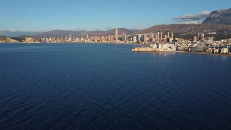 Aerial-view-of-Benidorm-and-the-mountains-range-inland