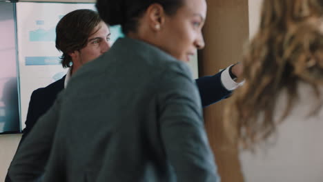 funny-businessman-celebrating-in-boardroom-successful-corporate-victory-colleagues-throwing-papers-excited-applause-in-office-meeting-enjoying-winning-success-4k