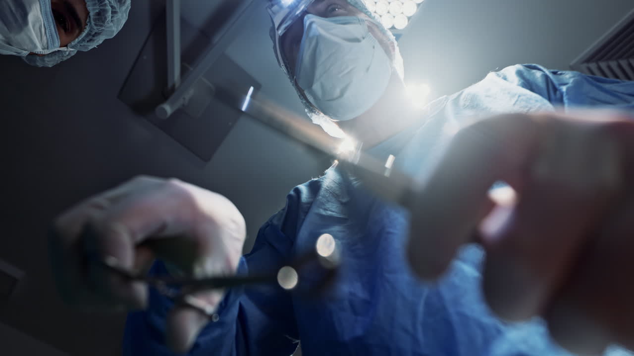 Team, doctors and below in surgery