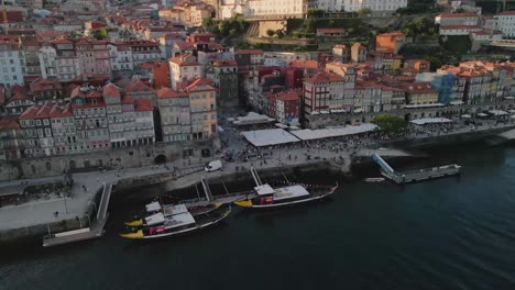 aerial view of rabelo boats moored at porto's cais da ribeira, portugal