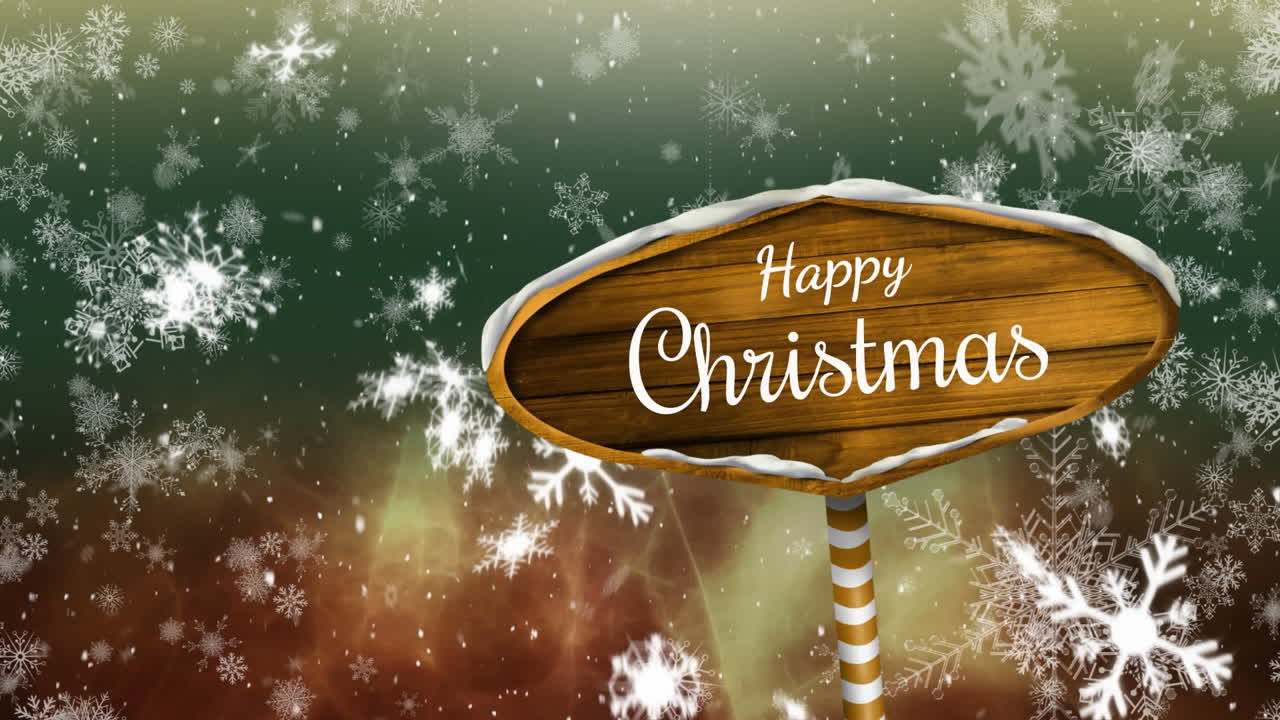 나무 표지판에 쓰여진 크리스마스 축하와 눈이 내리는