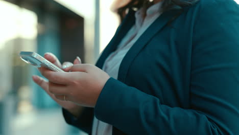 business woman, hands and phone in city typing