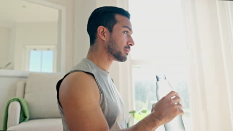 Fitness,-drinking-water-and-man-in-home