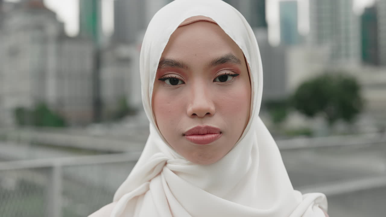 Woman Wearing a Hijab in a City