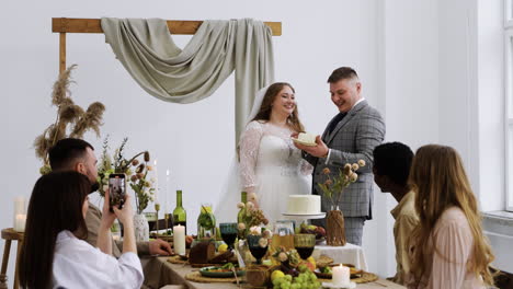 wedding couple with the dessert on the banquet