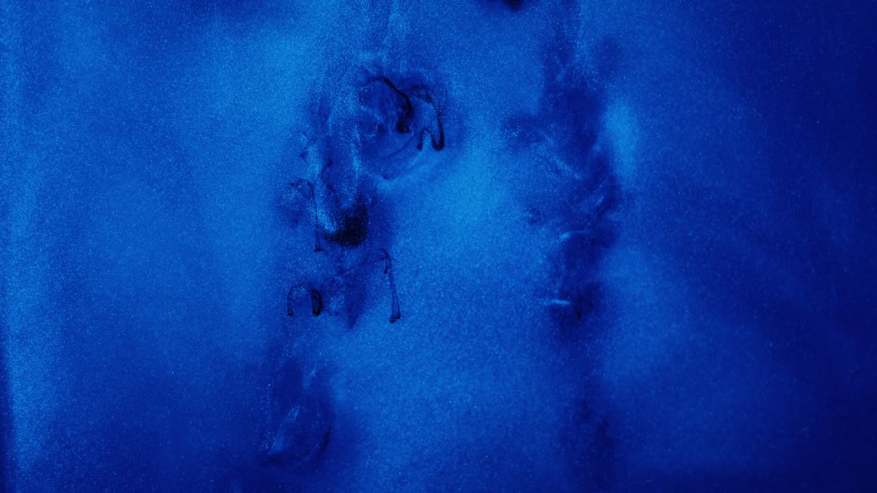 Abstract Blue and Black Ink Mix