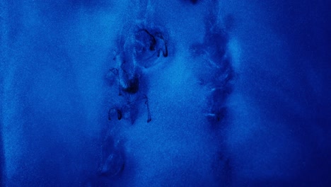 Abstract Blue and Black Ink Mix