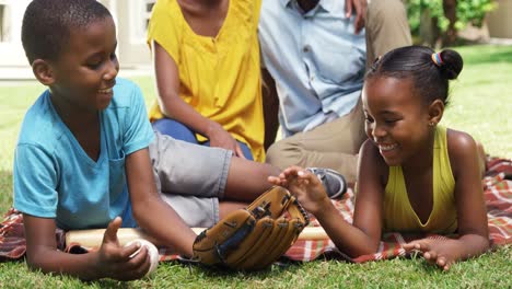 children playing with a baseball