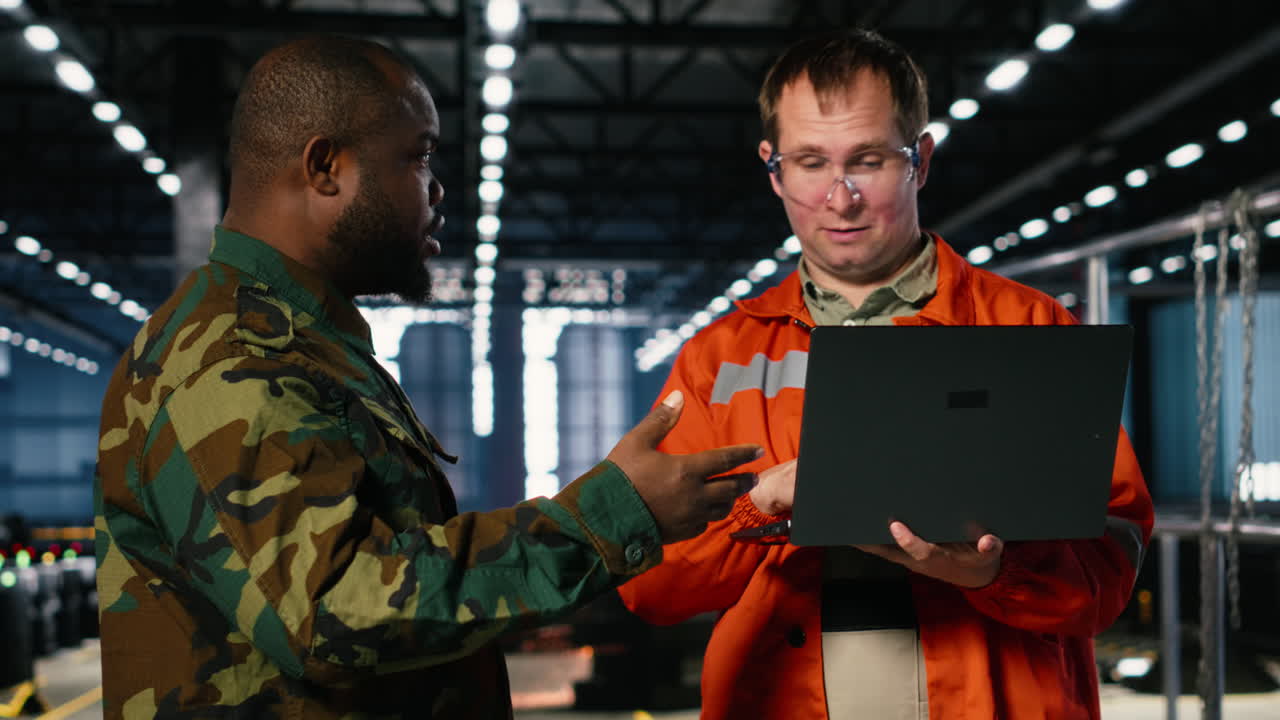 Workers focused on wartime production through industrial facility