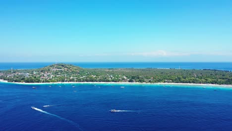 paradise island in a tropical ocean, bali, indonesia, boats sailing in the blue waters