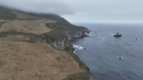 ocean cliffs of big sur california - aerial flyover