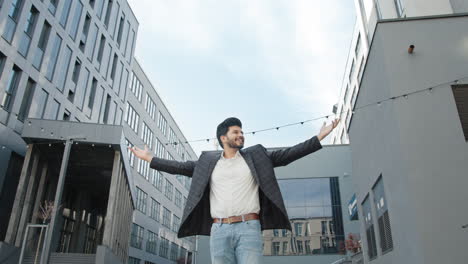 happy businessman in city