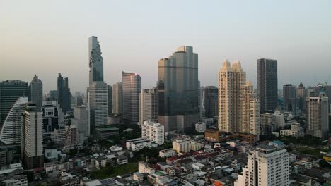 A-breathtaking-view-of-Bangkok-skyline-captured-by-a-drone-on-a-clear-day,-showcasing-the-city's-vibrant-and-modern-architecture