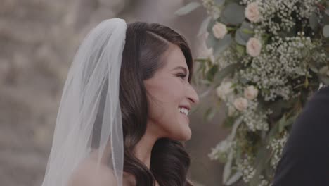 candid shot of bride laughing and smiling