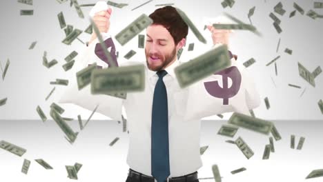 Composite-video-of-businessman-holding-money-bags-