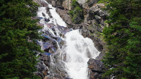 majestic waterfall cascading down rocky terrain