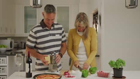 Couple-preparing-food-in-their-kitchen