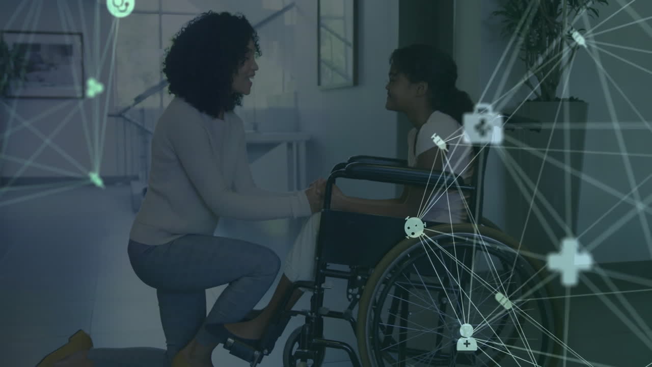 Mother kneeling holding daughter in wheelchair indoors featuring medical icons and network lines