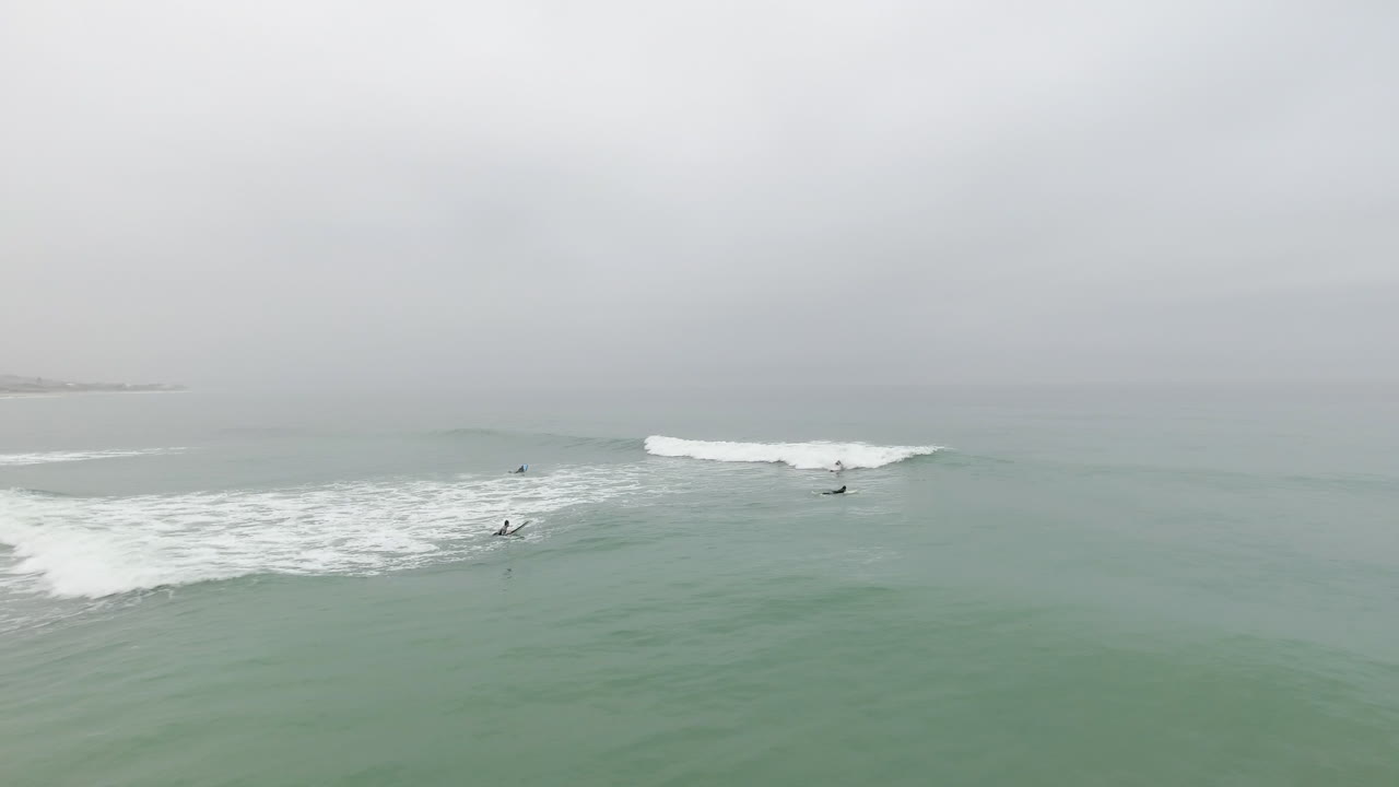 Aerial of surfing along exotic coast of South Africa