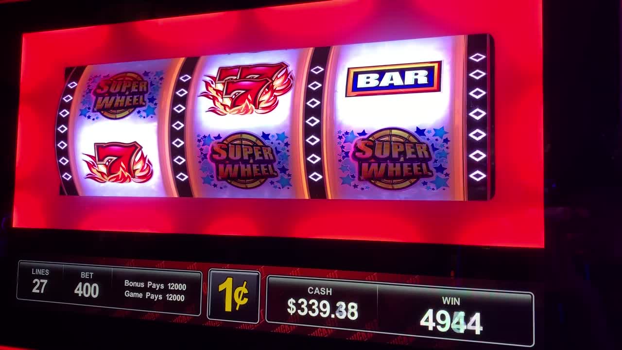 Slot machine LIVE PLAY! A "Quick Hit Super Wheel" slot machine hitting a bonus feature that allows you to spin the Super Wheel.