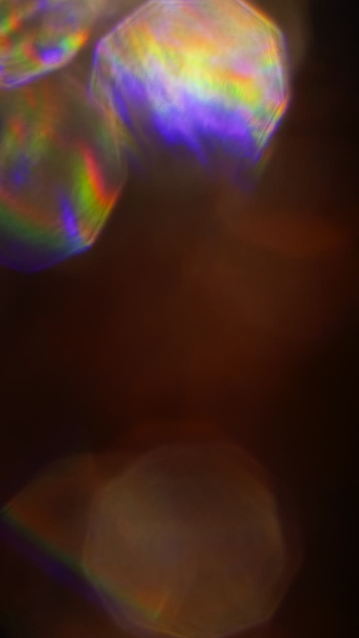 Sfondo Astratto con Effetti Bokeh di Luce Arancione Caldo