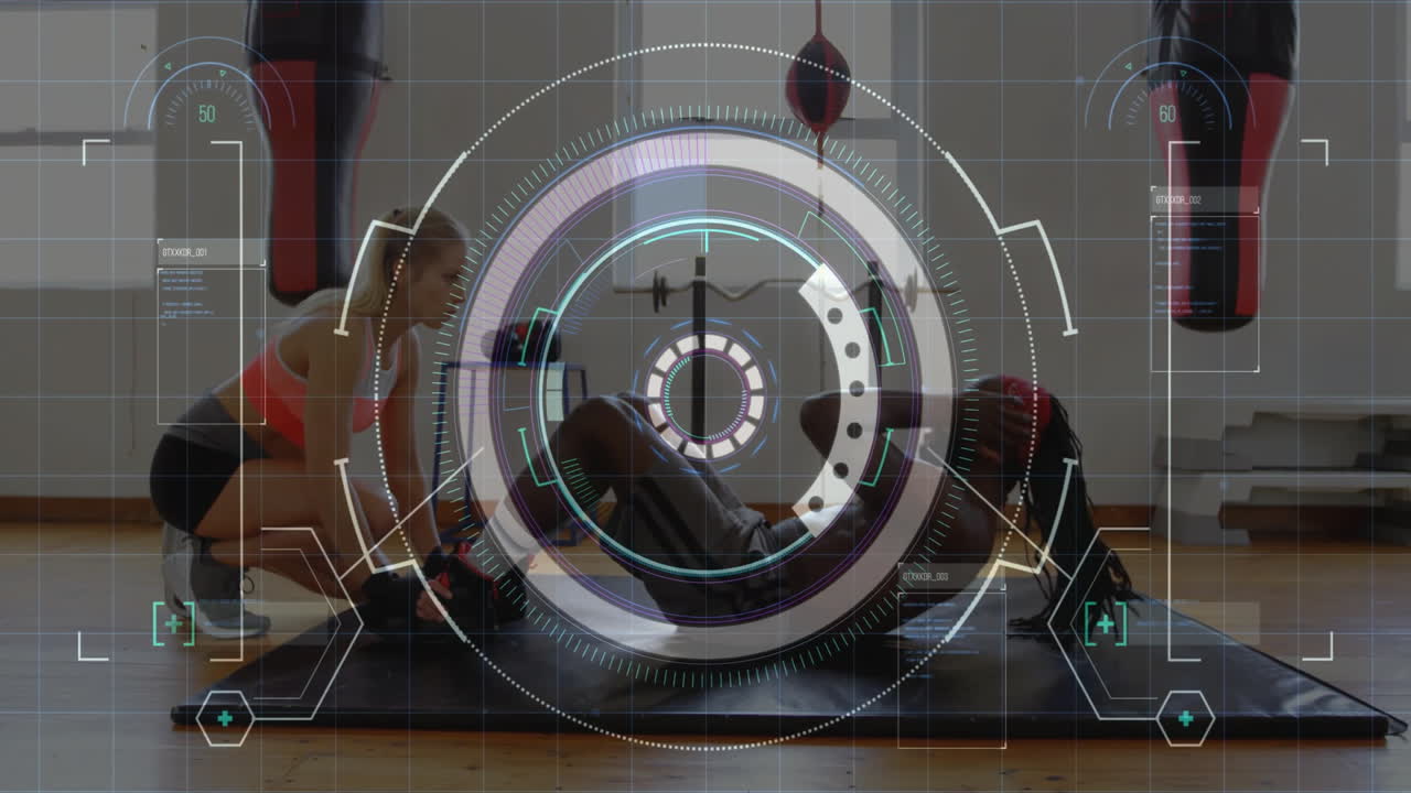 trainee performing sit-ups on mat, trainer holding feet, HUD overlay displaying fitness data