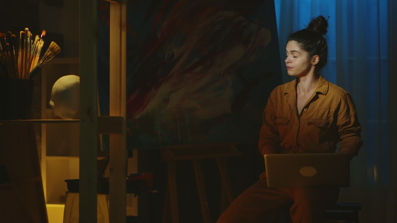 Painter using laptop